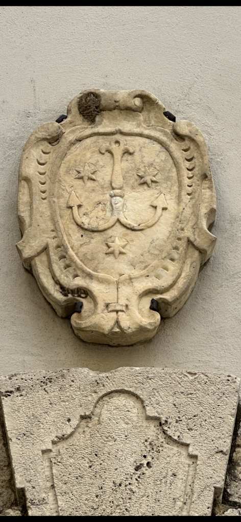 Tamanti Family Crest Above Doorway Entrance